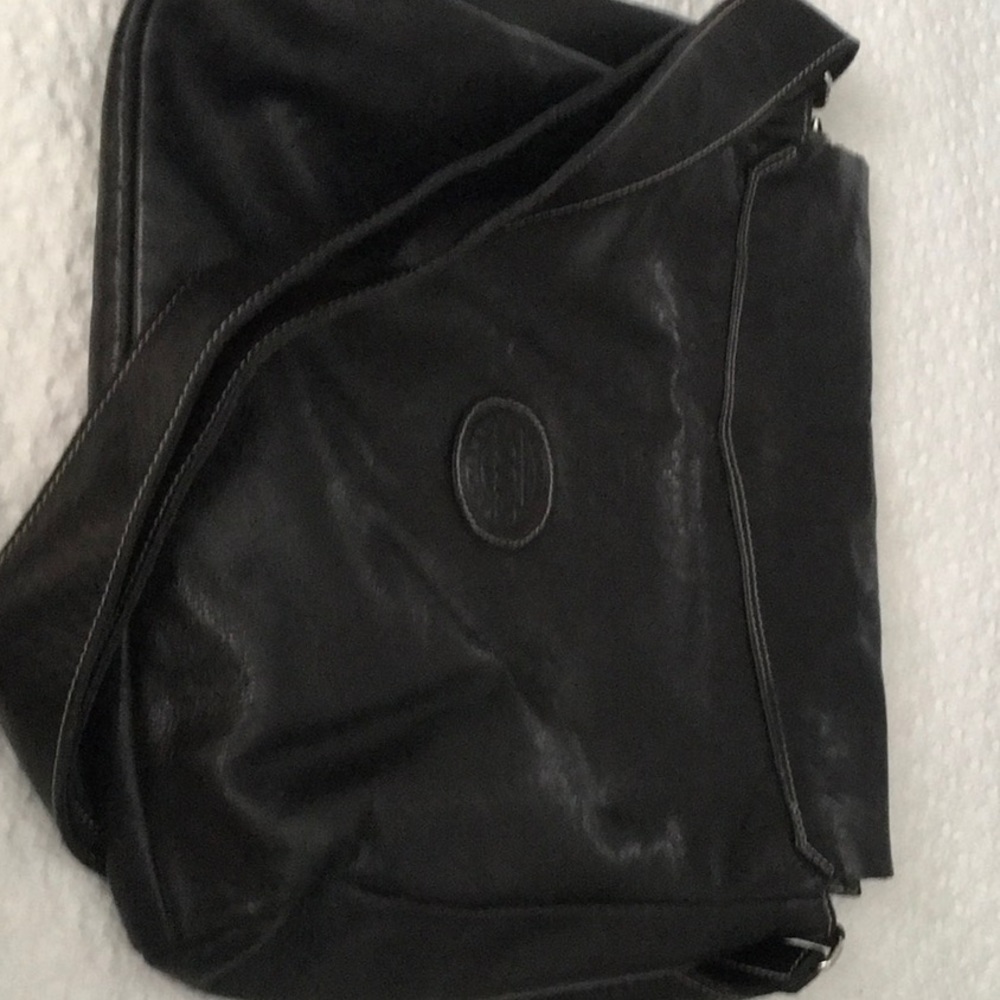 Roots leather messenger bag.